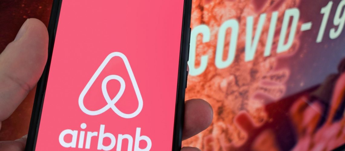 airbnb-logo-on-mobile-phone-covid-19-background-what-will-happen-to-airbnb-hosts-during-corona-virus_t20_kL7kar-1